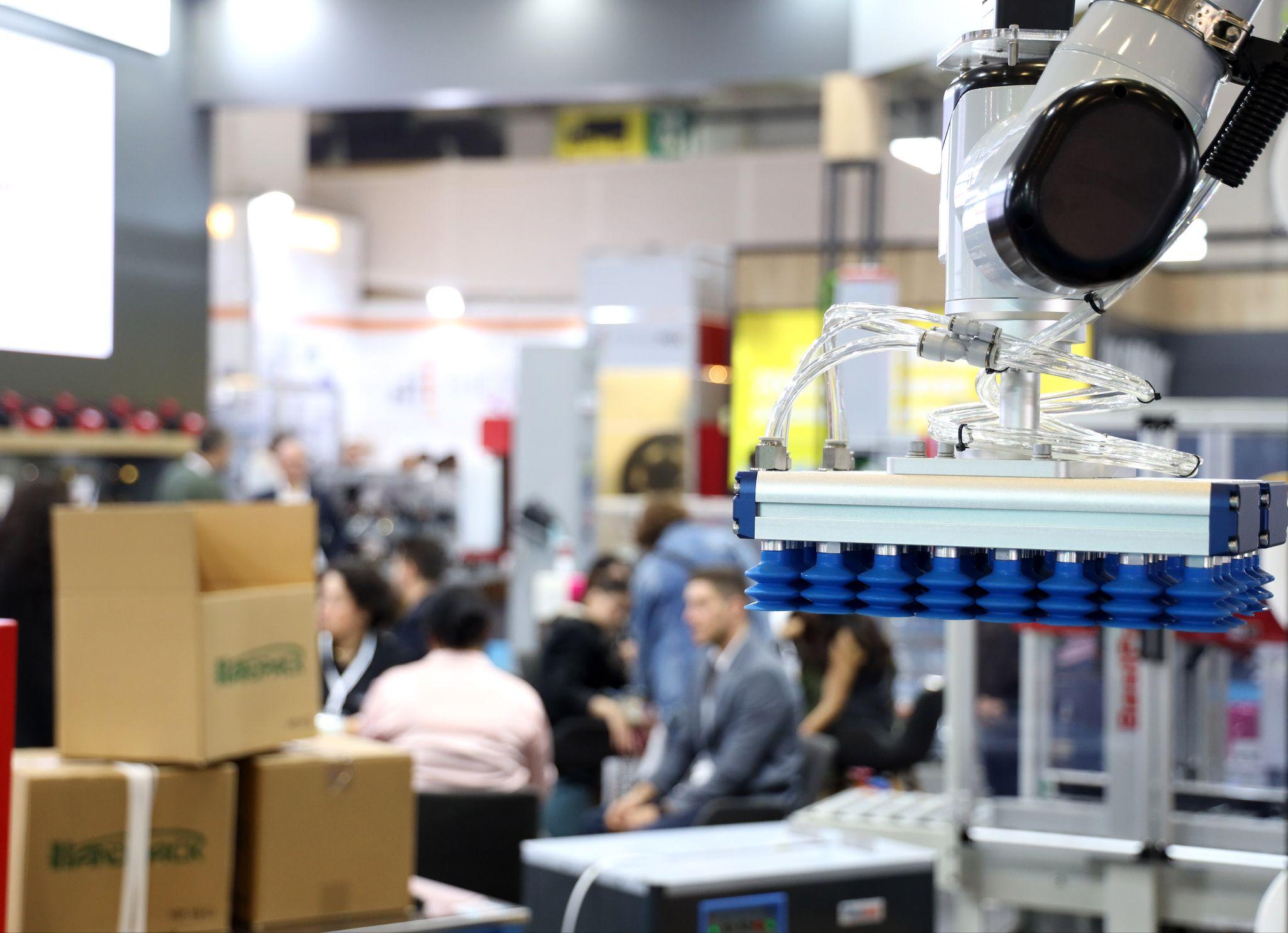 With 77,165 visitors in 2025, Istanbul fair prepares for its 31st edition: a robotic vacuum gripper lifting cartons on an exhibitor stand at Eurasia Packaging Istanbul